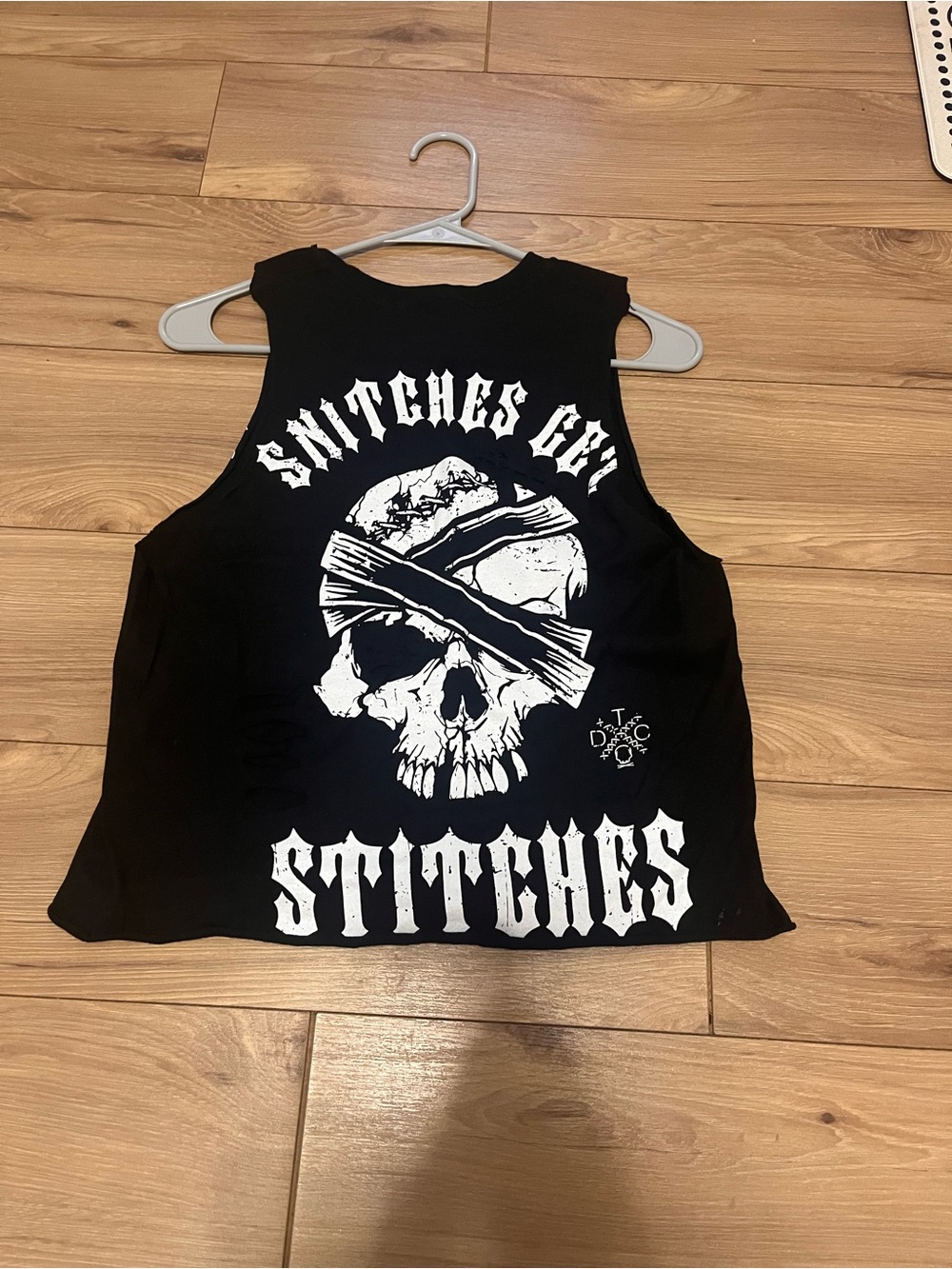 The Drive Black Graphic crop Tank - "Snitches Get Stitches"